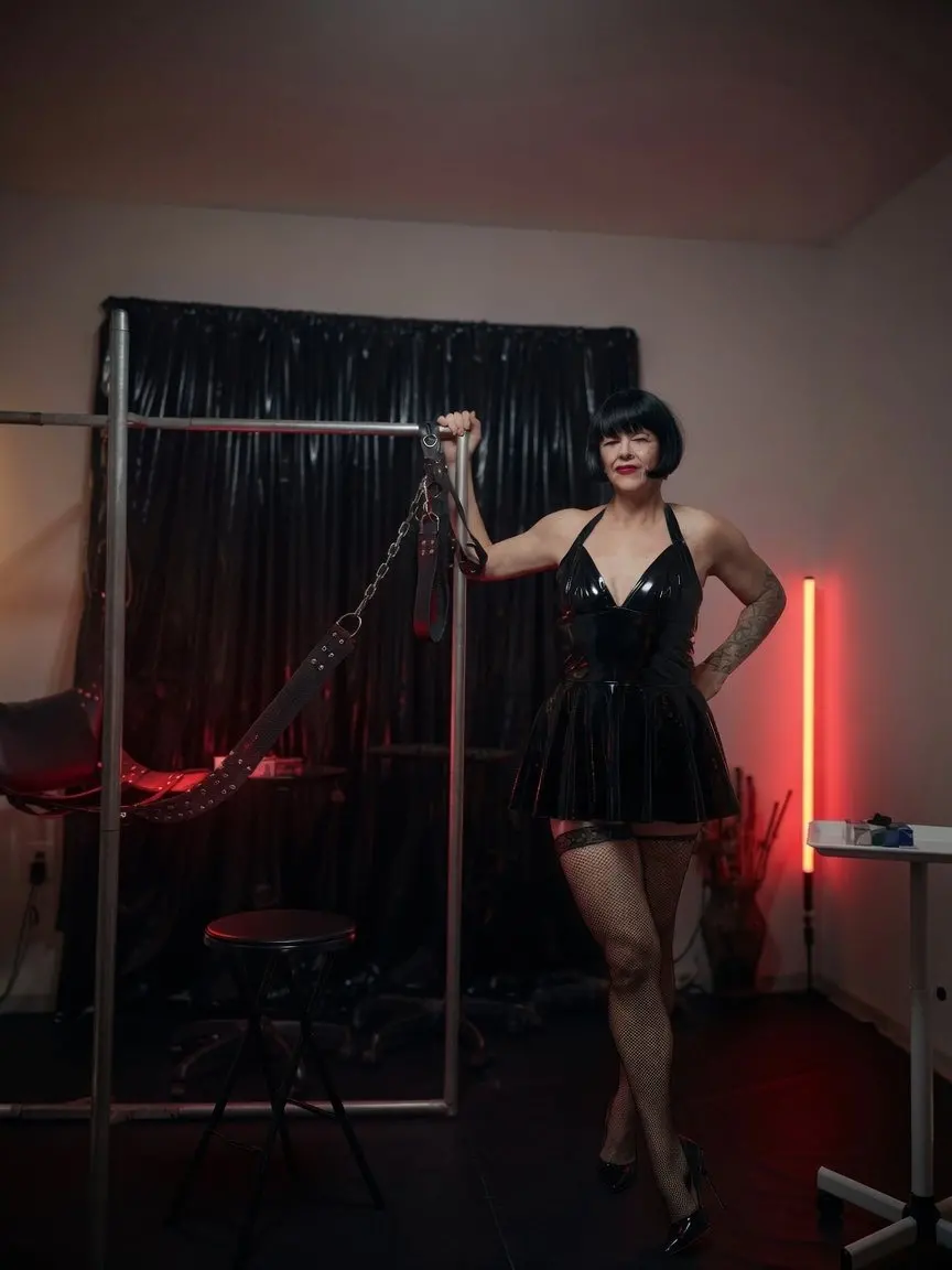Ts Mistress Mia in black pvc dress and a sex swing